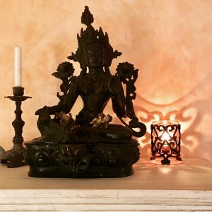 Buddha und Kerzen-Schattenspiel